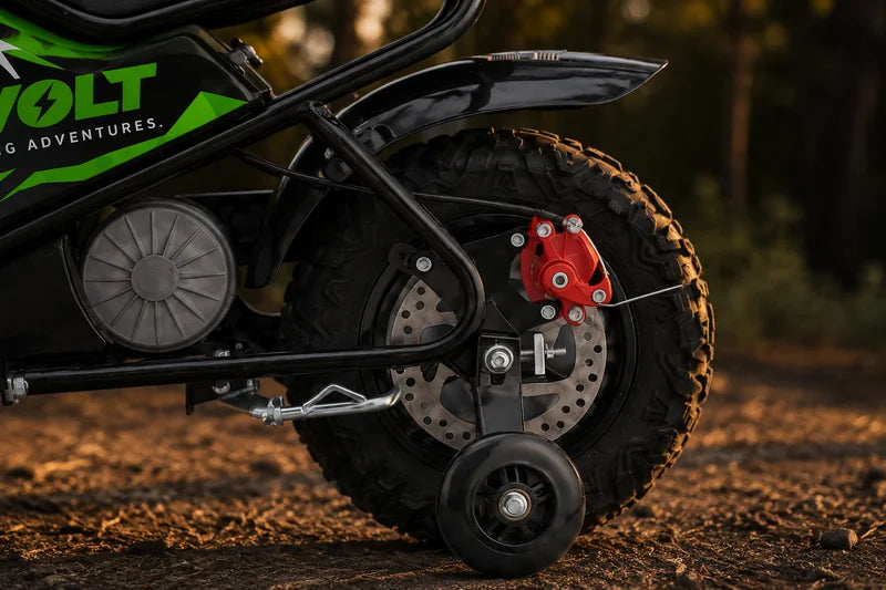 Close view of the CubVolt One rear tyre, red disc brake and stabiliser wheel